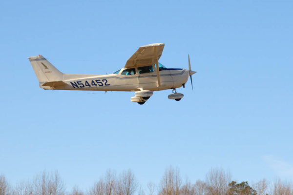 Survey crew in March flying over the shoreline of the James River. Photo by Bart Paxton.
