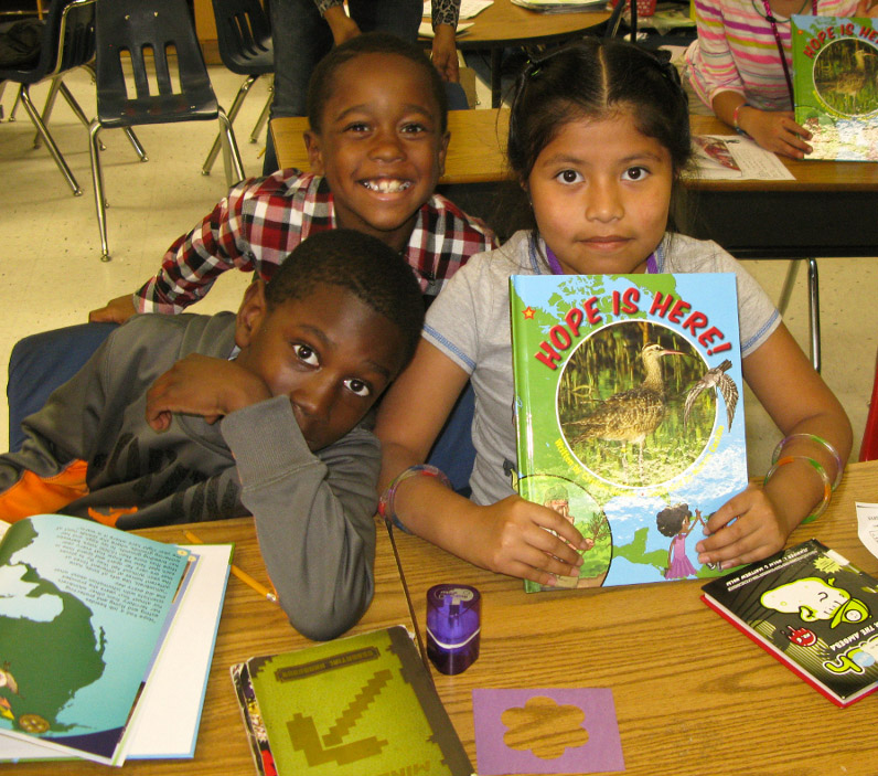 Children from Pungoteague Elementary School in Virginia with Hope is Here book.